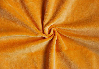 超柔短毛絨與仿超柔短毛絨的區別及其在箱包銷售中的應用